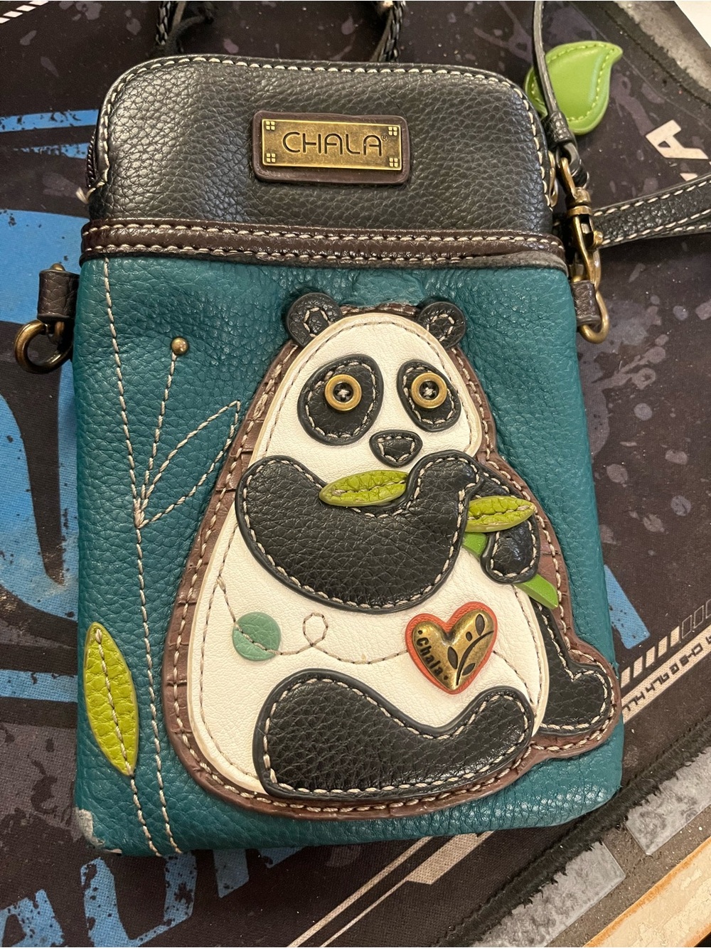 Chala Teal and Black Panda Crossbody Bag with Green Accents